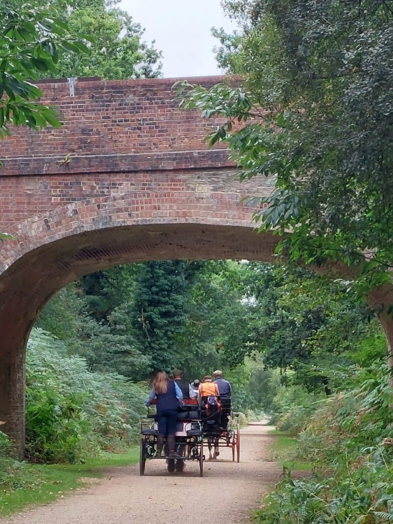 carriage driving along the disused railway